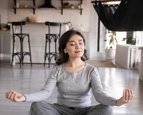 Take a few moments to meditate in the as part of your morning self-care routine.