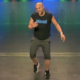 Daniel Dos Santos Teaching Latin Cardio Dance on our stage at Community Fitness.